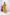 Woman wearing a yellow outfit standing in a minimalistic setting with white background and decorative elements. Freo
