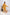 Woman wearing a yellow outfit standing in a minimalistic setting with white background and decorative elements. Freo