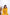 Woman wearing a yellow dress with floral details against a white background. Freo