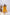 Woman wearing a yellow dress with floral details against a white background. Freo